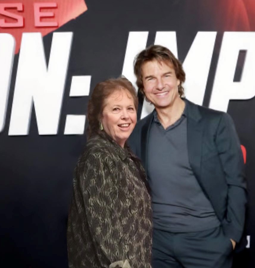 Andrea Sims with Tom Cruise at a film premiere