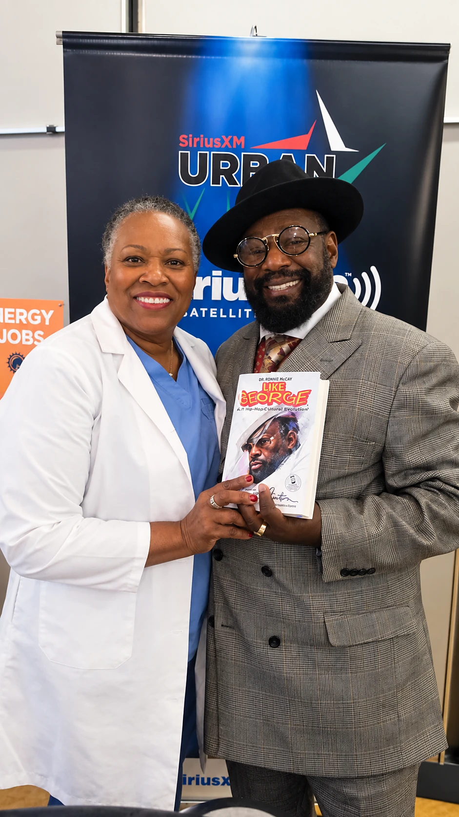 Maggie Linton with an author guest at SiriusXM